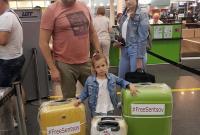 В Борисполе появились наклейки на чемоданы с надписью #FreeSentsov