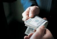 Задержано полицейского на взятке 2 тыс. долларов